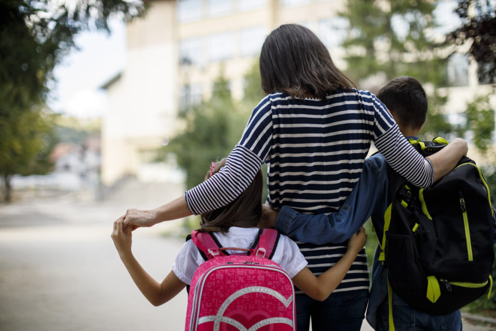 students going back to school at a New Braunfels elementary school