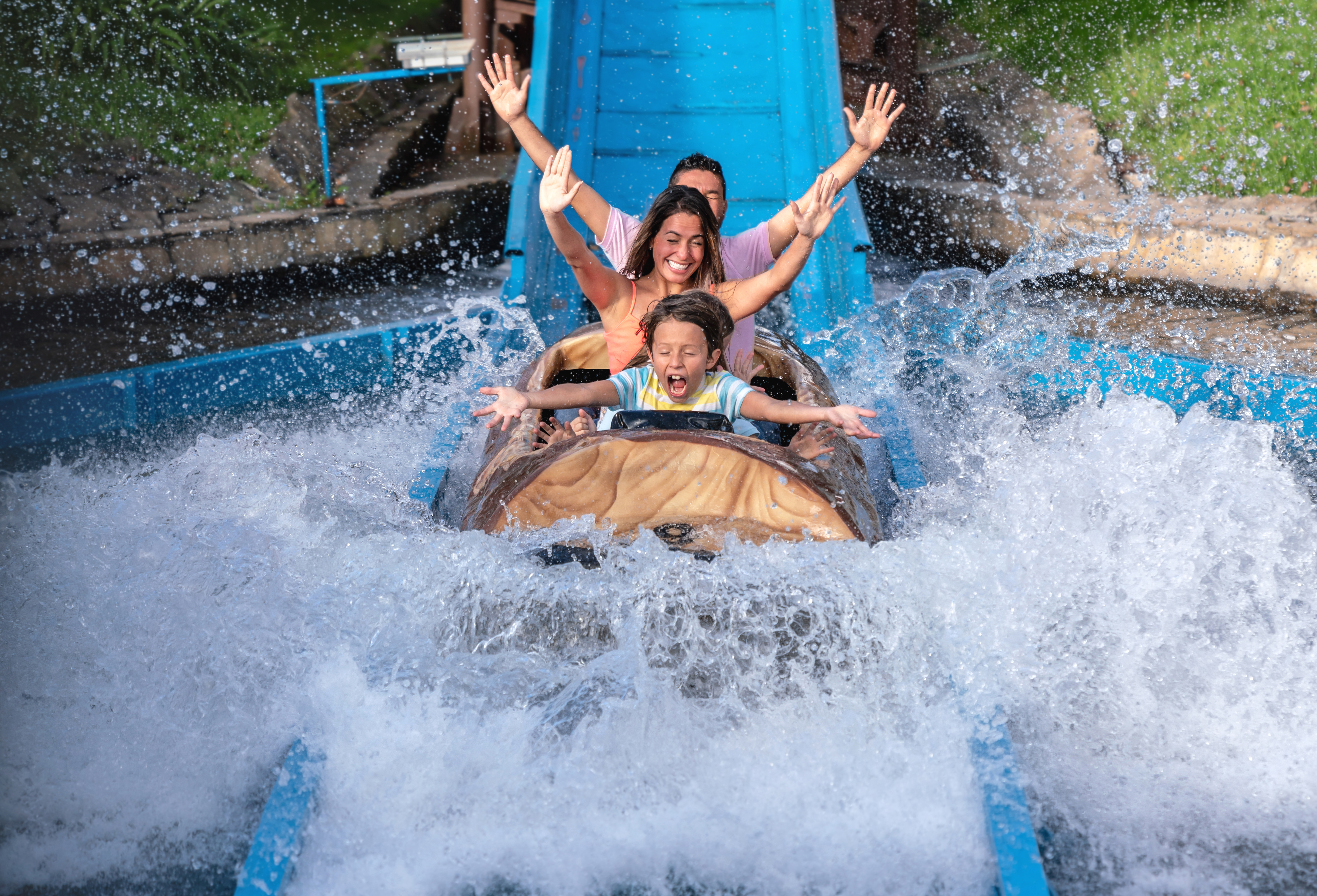 Family riding the tube chute ride at Schlitterbahn New Braunfels