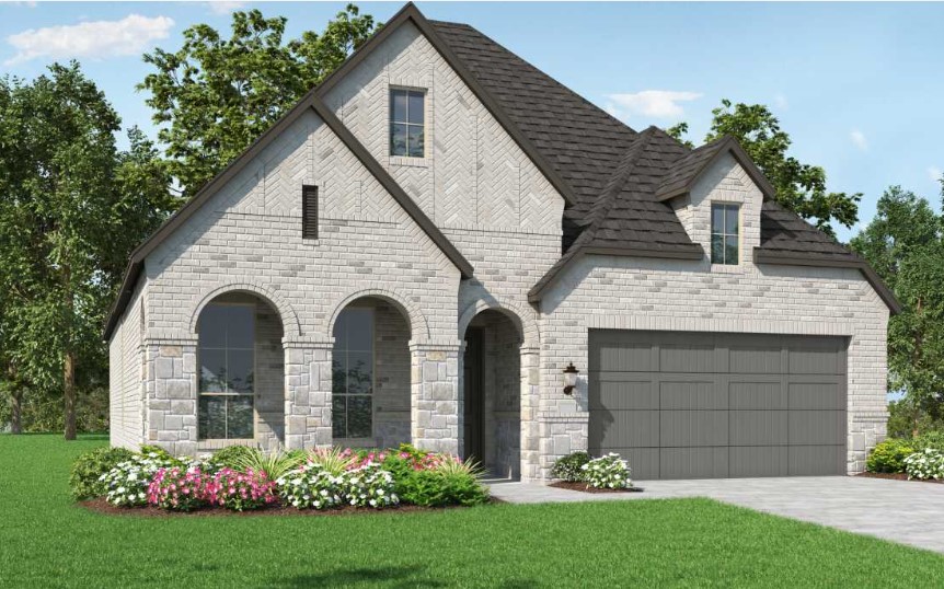 Front-facing view of one story home with white stone and dark grey accent color