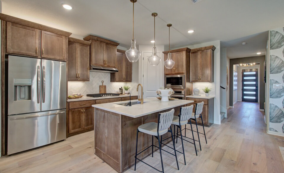 Interior view of custom kitchen with natural wood detailing