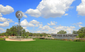 Meyer Ranch entrance with a windmill on the left side.